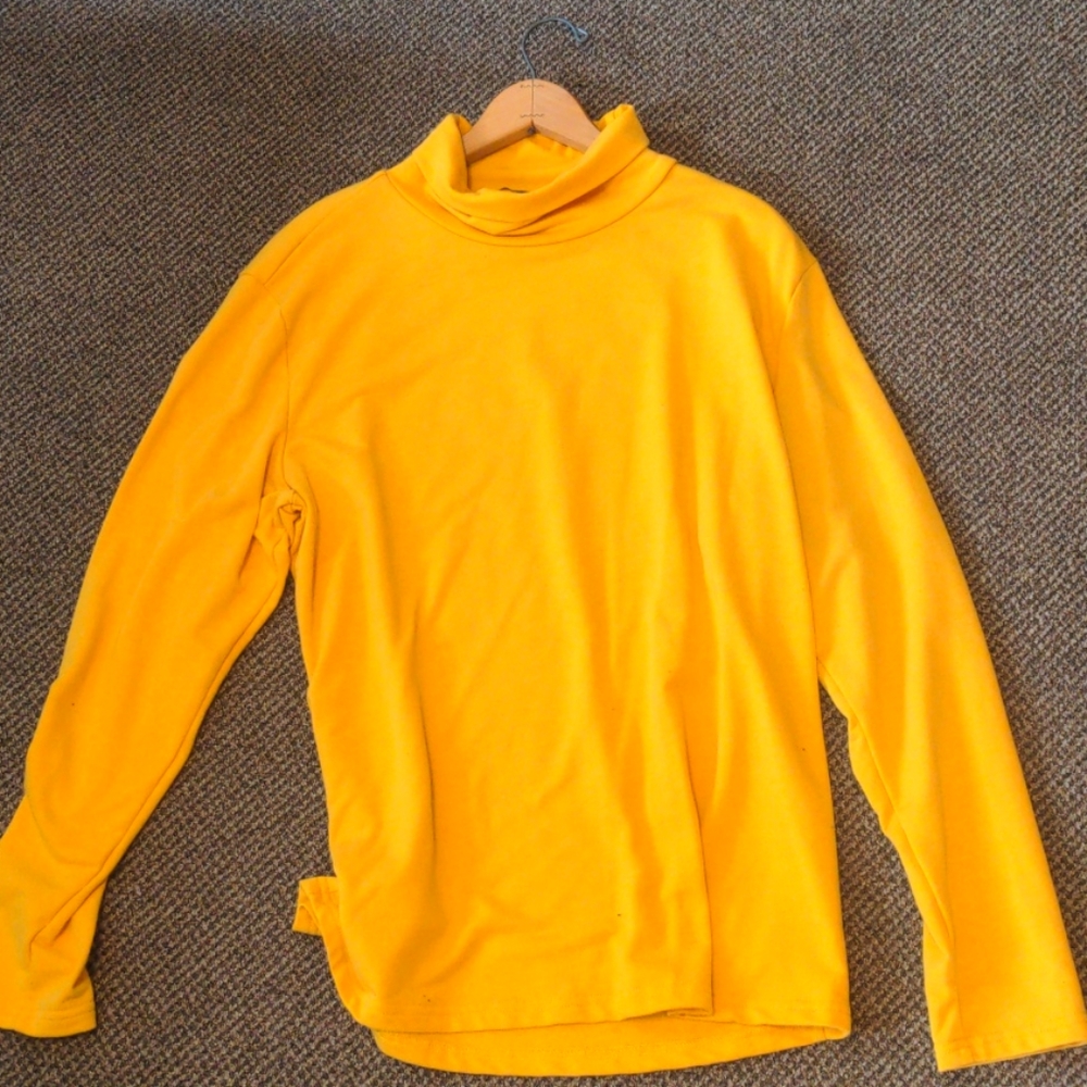 Yellow turtleneck sweater